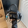 Retro black patent leather handbag with silver buckles and a cute bear charm - Black with Pendant