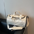 Cream white duffel fitness bag with black contrast trim and adjustable shoulder strap - Off-white