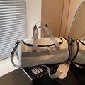 Large beige sports gym bag with grey straps and adjustable shoulder pad detail - Gray