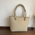 Leopard print tote bag in beige with faux fur texture and silver metallic buckles - Khaki