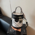 Cylindrical bucket bag with black and white diamond quilting and silk scarf handle detail - Black