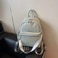 Chic sage green litchi leather backpack with stylish woven strap for urban commuting - Green