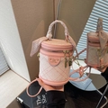 Pink and white checkered bucket bag with DM logo and floral scarf handle detail - Pink