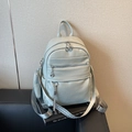Light mint green faux leather backpack with textured wide strap and coin purse - Blue