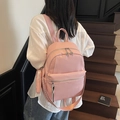 Chic pink leather backpack for women with stylish patterned strap and round coin purse - Pink