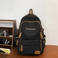 Schwarzer Canvas Rucksack mit braunem Lederbesatz und TIANFLONG Logo für die Schule - Schwarz