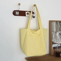Minimalist light yellow canvas tote bag with double front pockets and large capacity - Yellow