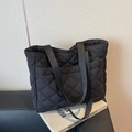 Classic black quilted tote bag with diamond pattern and wide straps for autumn style - Black