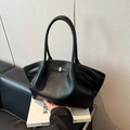 Elegant black pleated tote bag with lychee grain texture and gold metal ornament detail - Black