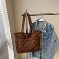 Quilted dark brown tote bag with glossy finish and long shoulder straps for daily use - Brown