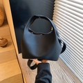Sac seau classique en cuir noir à grain litchi avec design à poignée unique élégant - Noir