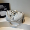 Large beige travel bag with wet-dry separation and NINGJIA logo in cylindrical shape - Off White