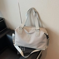 Borsa da viaggio grigio chiaro con trama a nido d'ape, manici e tracolla regolabile - Grigio