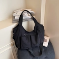 Black large capacity nylon tote bag with functional pockets and adjustable strap - Black
