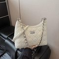 White quilted leather bucket bag with silver chain strap and metal turn-lock closure - Large / Off White