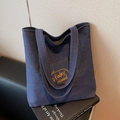 Dark blue denim tote bag with orange Today Mood embroidery and functional front pocket - Dark Blue