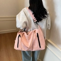Pink large capacity travel bag in matte leather worn on shoulder for gym or trips - Pink