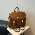 Chic vintage brown faux leather backpack with gold twist lock for stylish women - Brown