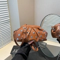 Brown leather cloud bag with silver studs and pleats, featuring adjustable shoulder strap - Brown