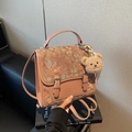 Pinkish-brown retro backpack with floral fabric, bow accents, and a plush bear charm - Dark Khaki With Pendant