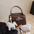 Dark brown crocodile embossed handbag with silver buckle and white pegasus charm - Brown