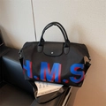 Grande borsa tote in nylon nero con design a lettere HMS e tracolla regolabile per viaggi - Nero