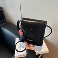 Minimalist black leather square crossbody bag with stylish red cherry charm decoration - With Charm / Black
