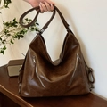 Large dark brown retro hobo bag with vintage texture and silver zipper details - Brown