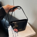 Retro black leather bucket bag with cherry charm and gold text on front surface - With Charm / Black