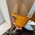 Mini yellow crossbody bucket bag with cherry charm and fashion leather print - With Charm / Yellow