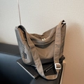 Minimalist khaki pleated nylon crossbody bag with dual zippers and adjustable buckle - Gray