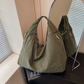 Olive green large canvas hobo bag with side zipper and casual slouchy tote style - Green