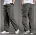 Front and back view of loose fit men's dark grey casual pants with elastic waist - M / Army Green