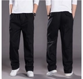 Detailed front and back view of men's black loose casual pants with elastic waistband - M / Black