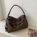 Chic dark coffee tote bag with pebbled leather texture and decorative strap buckle - Brown