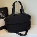 Black large capacity travel bag with quilted nylon design and versatile handles - Black