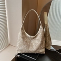 Chic beige tote bag with floral patterns and leather handles for casual autumn style - Off White