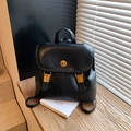 Vintage black matte leather backpack featuring a gold rotary lock and flap design - Black