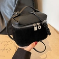 Mini borsa a secchiello nera in pelle litchi e pelle scamosciata con manico in metallo - Nero