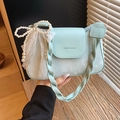 Mint green leather shoulder bag with woven handle and pearl bow charm detail - Green with Pendant