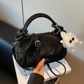 Black pleated leather cloud bag with long strap and white plush doll keychain - Black
