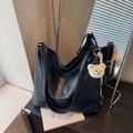 Chic black large capacity tote bag with bear charm and soft textured leather finish - Black