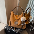 Vintage mustard yellow suede hobo bag with M metal logo and plush cloud charm - Orange With Pendant