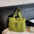 Lightweight mustard green nylon tote bag with drawstring pockets and workwear style - Green
