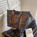 Denim tote bag with brown leather lattice design and metal rivet shoulder strap - Dark Blue