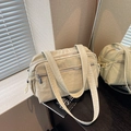 Minimalist light green nylon tote bag with functional multi-zipper pockets and drawstring - Off-white
