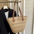 Beige woven straw tote bag with brown leather shoulder straps for summer beach vacations - Khaki