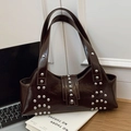 Dark brown leather shoulder bag with metallic silver rivets and a vintage punk design - Brown