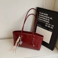 Deep red oily leather tote bag with MIKAXIQI logo and decorative tennis racket charm - Ankara Red (With Pendant)