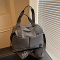 Dark grey large travel backpack in water-resistant nylon with adjustable shoulder straps - Gray